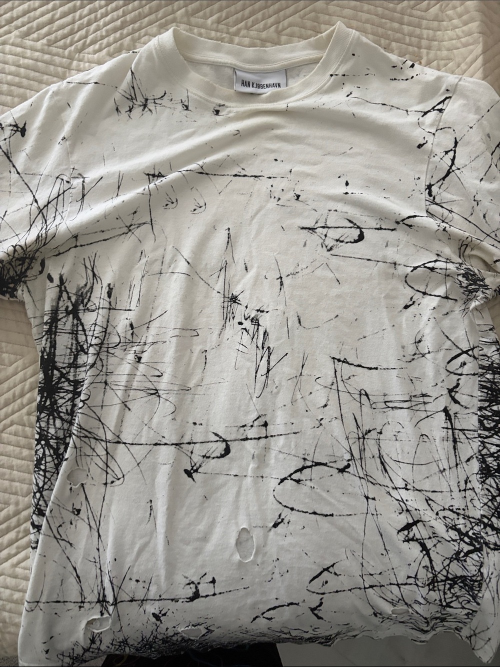 White Graphic Scribble Print Men's T-Shirt distressed with holes and oversized